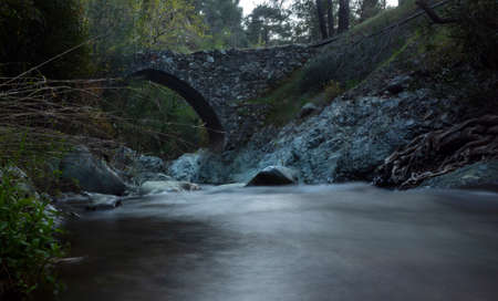 Ancient stone Venetian bridge in the Troodos mountains on the island of Cyprus.