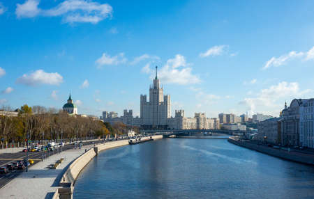 October 22, 2017 Moscow, Russia. Cars on Moskvoretskaya embankment and a view of the high-rise on Kotelnicheskaya embankment in Moscow.