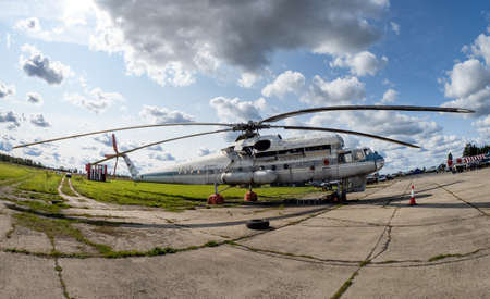 September 12, 2020, Kaluga region, Russia. Military transport helicopter (flying crane) Mil Mi-10 at...