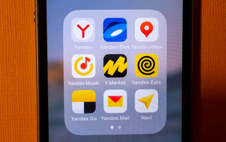 March 31, 2021. Moscow, Russia. Yandex application icons on a mobile phone screen.
