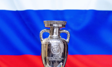 April 10, 2021. St. Petersburg, Russia. UEFA European Championship Cup with the Russian flag in the background.のeditorial素材