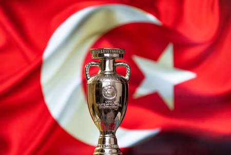 April 10, 2021. Istanbul, Turkey. UEFA European Championship Cup with the Turkish flag in the background.のeditorial素材