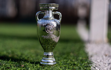 April 13, 2021 Moscow, Russia. The UEFA European Football Championship Cup on the green lawn of the football stadium.のeditorial素材