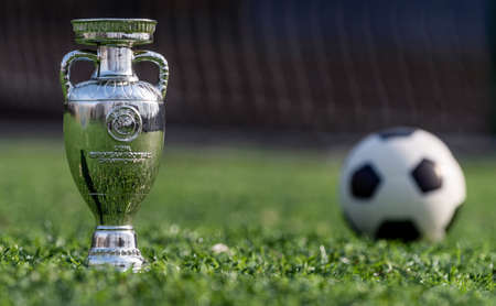 April 13, 2021 Moscow, Russia. The UEFA European Football Championship Cup on the green lawn of the...