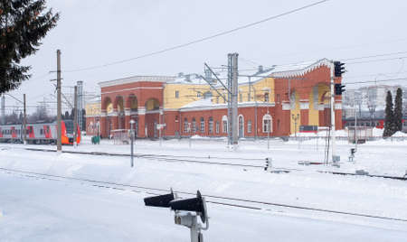 February 16, 2021, Orel, Russia. Electric train "Lastochka" at the platform of the Oryol railway station on a winter day.のeditorial素材
