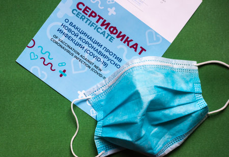 July 21, 2021 Moscow, Russia. Russian certificate of vaccination against a new coronavirus infection (covid-19)のeditorial素材