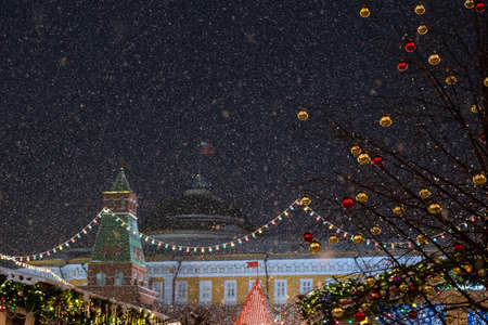December 25, 2020, Moscow, Russia. New Year's Fair on Red Square in Moscow during a snowfall.のeditorial素材
