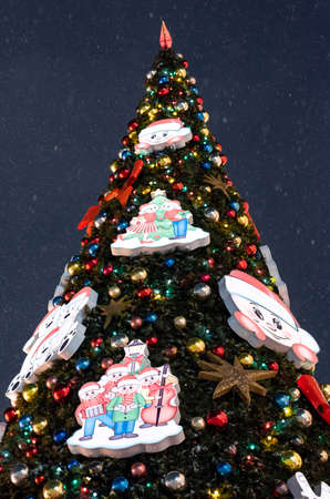 December 25, 2020, Moscow, Russia. New Year tree on Red Square in Moscow during a snowfall.のeditorial素材