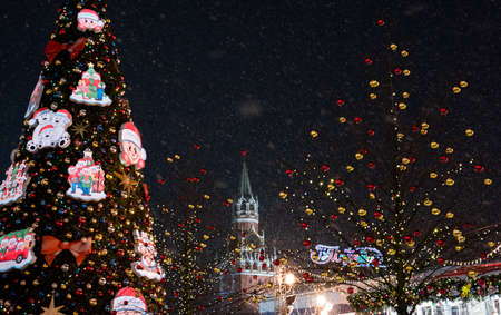 December 25, 2020, Moscow, Russia. New Year tree on Red Square in Moscow during a snowfall.のeditorial素材