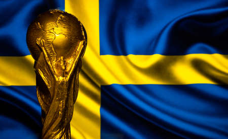 October 6, 2021, Stockholm, Sweden. FIFA World Cup on the background of the flag of Sweden.のeditorial素材