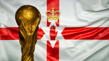 October 6, 2021 Belfast, Northern Ireland. FIFA World Cup Cup against the background of the flag of Northern Ireland.のeditorial素材
