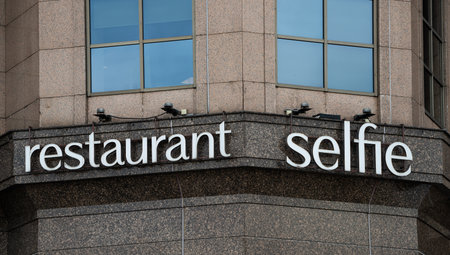 October 15, 2021. Moscow, Russia. Sign on the building of the Selfie restaurant on Novinsky Boulevard in Moscow, awarded one star of the Michelin Red Guide restaurant rating.のeditorial素材