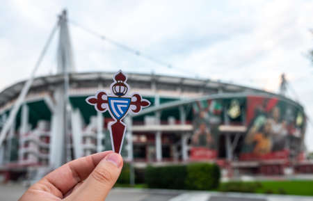 August 30, 2021, Vigo, Spain. The emblem of the RC Celta de Vigo football club against the background of a modern stadium.のeditorial素材