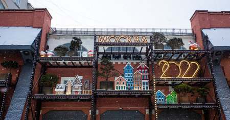 December 5, 2021, Moscow, Russia. A festive installation dedicated to the new year 2022 on the facade of a house in Moscow.のeditorial素材