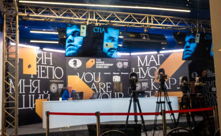 December 4, 2021, Moscow, Russia. Fan zone of the World Chess Championship match between Norwegian Magnus Carlsen and Russian Jan Nepomniachtchi at GUM in Moscow.のeditorial素材