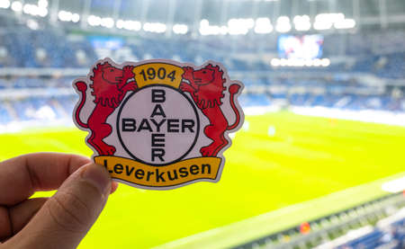 September 12, 2021, Leverkusen, Germany The emblem of the football club Bayer 04 Leverkusen in front of the modern stadium.のeditorial素材