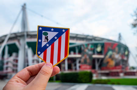 August 30, 2021 Madrid, Spain. The emblem of the football club Atletico Madrid against the background of a modern stadium.のeditorial素材