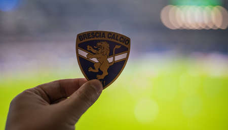 September 12, 2021, Brescia, Italy. The emblem of the football club Brescia Calcio against the background of a modern stadium.のeditorial素材
