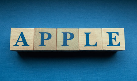 January 31, 2022. Cupertino, California. The name of the Apple company, laid out from wooden cubes.のeditorial素材