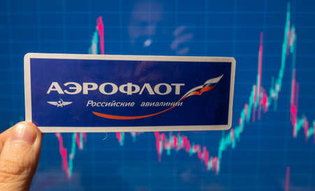 November 10, 2021, Moscow, Russia. Aeroflot emblem against the background of a share price chart.のeditorial素材