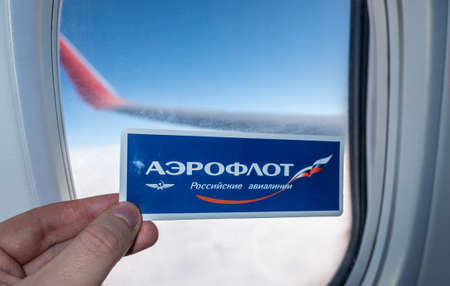 December 6, 2021, Moscow, Russia. The emblem of the airline Aeroflot on the background of the...
