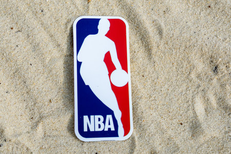September 15, 2021, Moscow, Russia. The emblem of the National Basketball Association on the sand of the beach.のeditorial素材