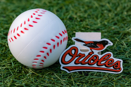 September 26, 2022, Cooperstown, New York. Baltimore Orioles baseball club emblem and baseball.のeditorial素材