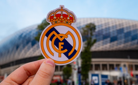 September 12, 2021 Madrid, Spain. The emblem of the football Real Madrid CF against the background of a modern stadium.のeditorial素材