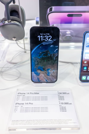 October 5, 2022, Moscow, Russia. The new Apple iPhone 14 Pro Max smartphone on the shop window.のeditorial素材