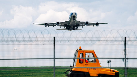 July 13, 2019 Moscow, Russia. An AirBridgeCargo Boeing 747 cargo plane comes in for landing at Sheremetyevo International Airport on a cloudy day.のeditorial素材