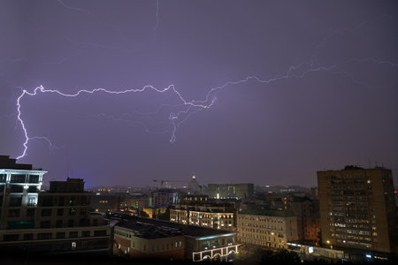 July 10, 2021. Moscow Russia. Lightning flashes in the sky over the city on a warm summer night in the Russian capital.のeditorial素材