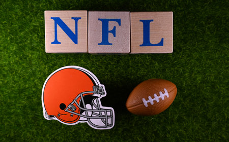 January 27, 2023, Canton, USA. The emblem of the Cleveland Browns football club on the green lawn of...