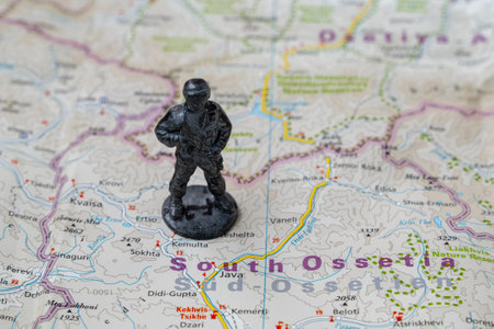 A metal toy soldier stands on the map of the Republic of South Ossetia.のeditorial素材
