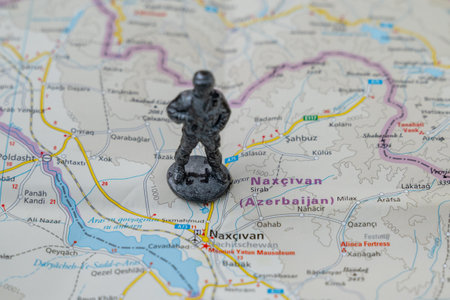 A metal toy soldier stands on the map of the Autonomous Republic of Nakhichevan in Azerbaijanのeditorial素材