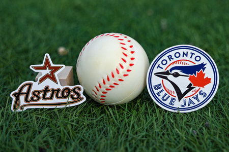October 3, 2023, Baltimore, United States. Emblems of baseball clubs participating in the 2023 playoffs of the Toronto Blue Jays and Houston Astros on the green law of the stadium.のeditorial素材