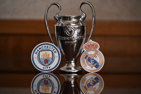 March 20, 2024, London, United Kingdom. Emblems of football clubs participating in the Champions League playoffs Real Madrid and Manchester Cityのeditorial素材