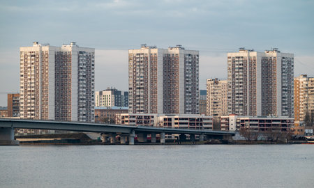 Multi-storey residential complex on the river bank in a residential area