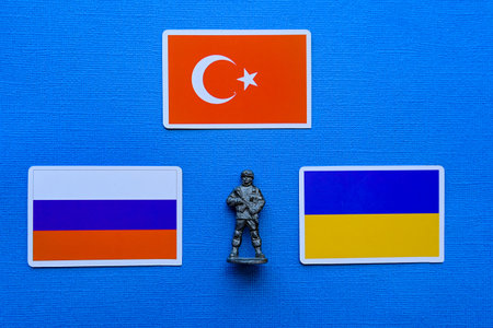 Flags of Russia, Ukraine and Turkey on a blue background. The Russian-Ukrainian conflict.の写真素材