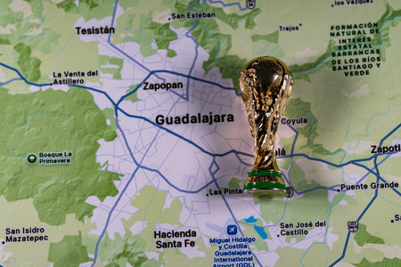 November 23, 2025, United States. Gold Cup on the background of a map of Guadalajara, one of the...