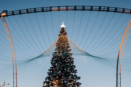 Christmas tree and New Year decorations on the town square on a frosty winter day.の写真素材