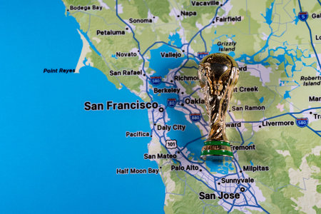 November 23, 2025, United States. Gold Cup on the background of a map of San Francisco, one of the cities hosting the 2026 FIFA World Cupの写真素材