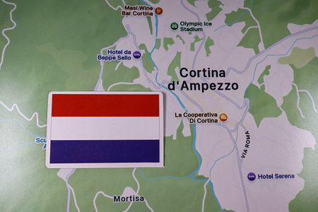 February 9, 2026, Milan, Italy. The flag of the Netherlands on the background of the Cortina...