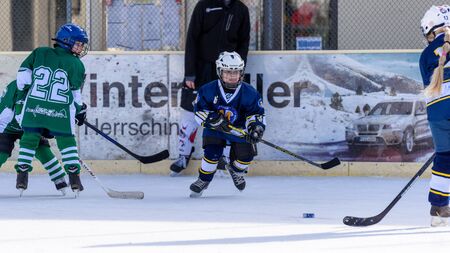 Fuerstenfeldbruck, Bavaria, Germany - 06. February 2016: German Kids playing ice hockey. Age is...