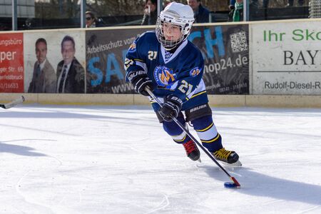 Fuerstenfeldbruck, Bavaria, Germany - 06. February 2016: German Kids playing ice hockey. Age is...
