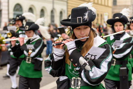 MUNICH, BAVARIA, GERMANY -  MARCH 13, 2016: Flutists in clothes of the Middle Ages at the St. Patrick's Day Parade. The name of the band is Spielmannszug Gilching.のeditorial素材