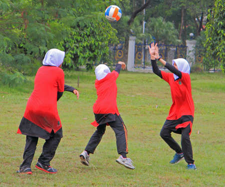 Kuala Lumpur, Malaysia - April 1, 2015 girls are playing volleyball in Shah Alam, Malaysiaのeditorial素材