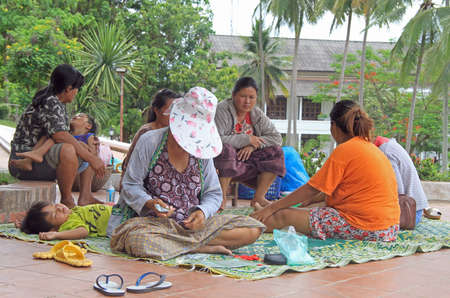 Luang Prabang, Laos - May 22, 2015 people are resting on the street in center of Luang Prabangのeditorial素材