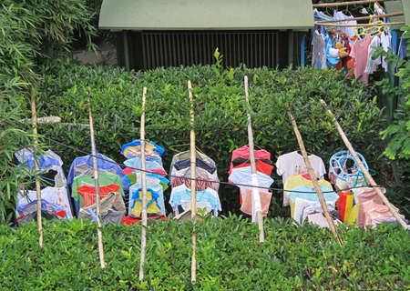 drying clothes on the street in Shanghai, Chinaの写真素材