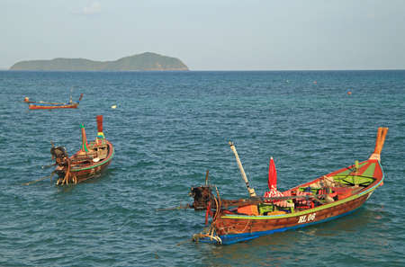 colorful boats nearly the shore, Phuket island, Thailandの写真素材
