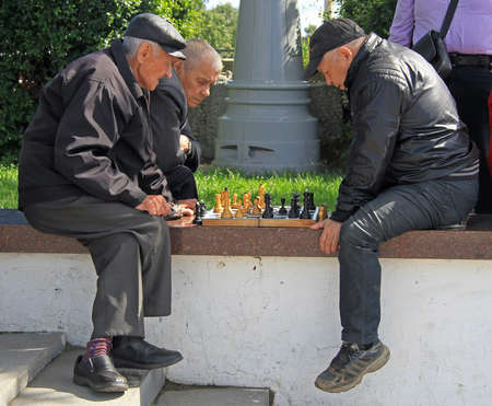 Yekaterinburg, Russia - July 20, 2015: men are playing chess outdoor in Yekaterinburg, Russiaのeditorial素材